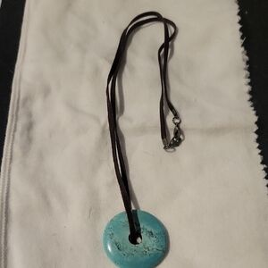 Source Unknown Turquoise Blue Donut Pendant on Brown Cord Necklace